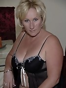 Blonde mature cunt takes on two black cocks