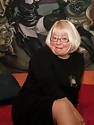 Big mature madame playing with her pussy