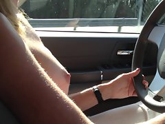 TITS OUT DRIVING ON FREEWAY