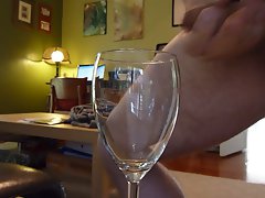 Ejaculating into a wine glass