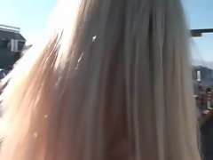 Blondie giving oral sex outdoors