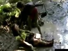Kinky lesbians with messy fetish get filthy in the mud