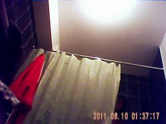 23 yo brunette with 34DD boobs caught by spycam in shower