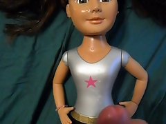 Dark haired Doll Getting Sprayed with Cum - Facial Cumshot