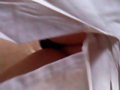 White skirt and black thong