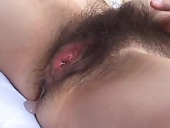 Jizz dripping from hairy asian pussy