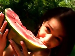 See what a naughty can do with a watermelon and her pink pussy!
