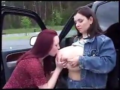 Redhead sucking huge tits and getting milf