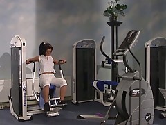 Brunette works out in gym and then gets worked on by trainer