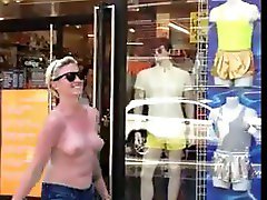 Woman walking topless through NYC