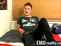 Sexy and young emo twink talks to the camera and jerks off