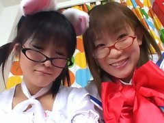 Super cute teen asian babes in costume teasing hard on camera