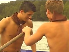 Two gay boys start sucking in boat and go to shore to fuck