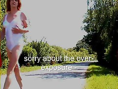 Tgirl walks along the road in her undies