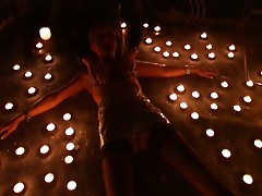 Busty girl surrounded by candles and get hot waxed
