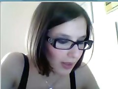 Skinny teen with glasses gives a show of her petite body on webcam