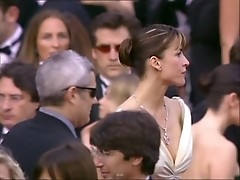 Oops! Sophie Marceau was unlucky to have her dress stretch slide off and denude her tit