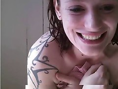 Tattoo'd girl showering