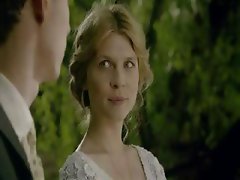 Blonde actress Clemence Poesy in scenes from one of her movies