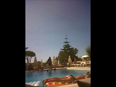 Topless girl in pool