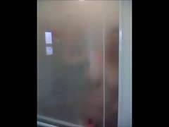 Spy on girl shaving in shower