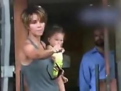 Halle Berry gets angry with the paparazzis as they continue to take...