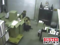 Horny coworkers get busted on security cam doing a blowjob in the warehouse office