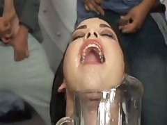 Brunette keeps a pitcher to collect all the sperm in a blowbang