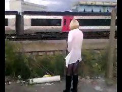 flashing at a train