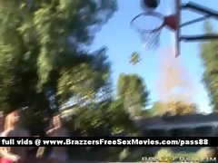 Three amateur chicks outside playing basketball